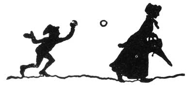Boy throwing a snowball at a woman